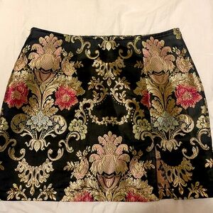 Black and gold brocade mini skirt with pink accents